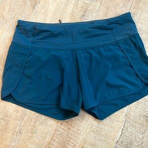 Lululemon Speed Up Women’s lined short. Size 6. Blue/Green.